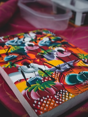 a colorful fabric with a black and white design