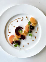 A beautifully plated meal on crisp parchment, highlighting textures and colors inspired by the rind and root.