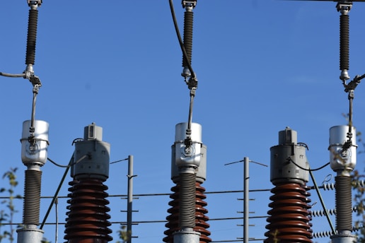 a group of towers with wires
