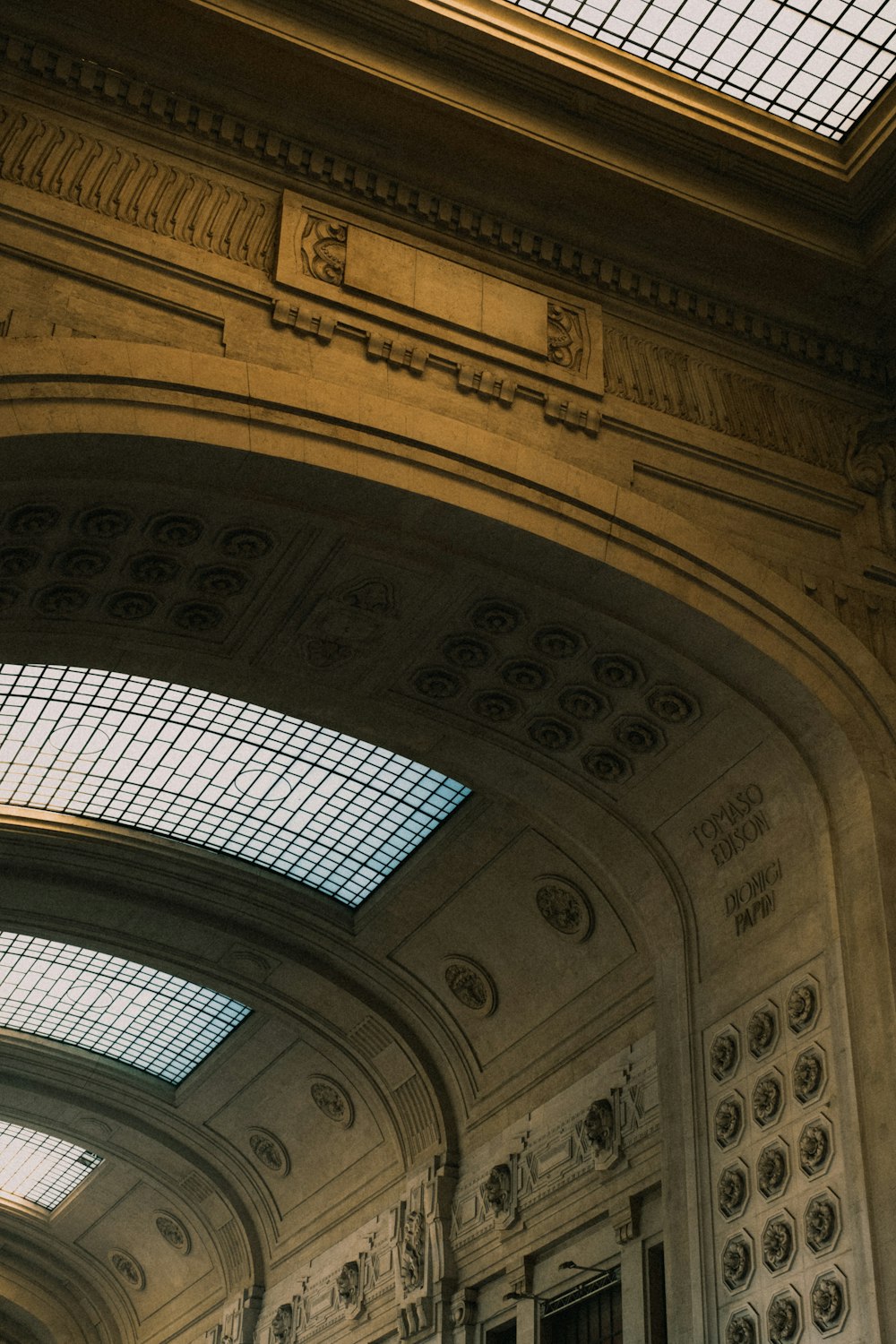 a large ornate ceiling with many arches