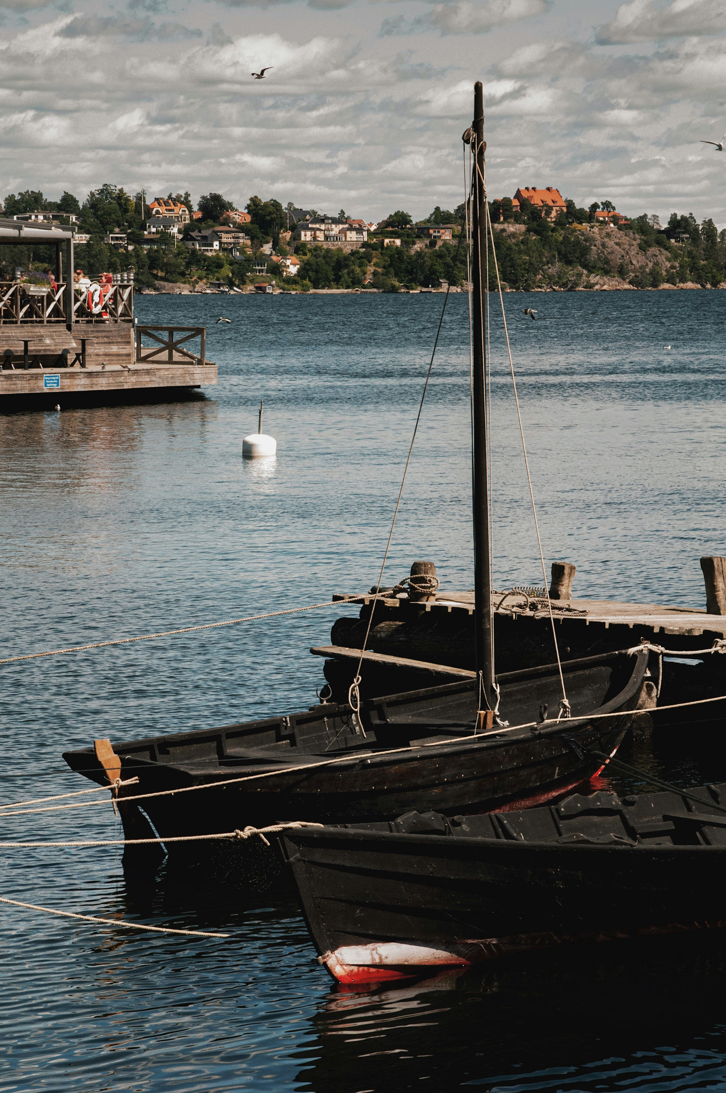 a boat tied to a dock