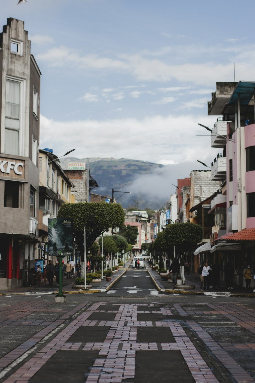 a street with buildings and trees