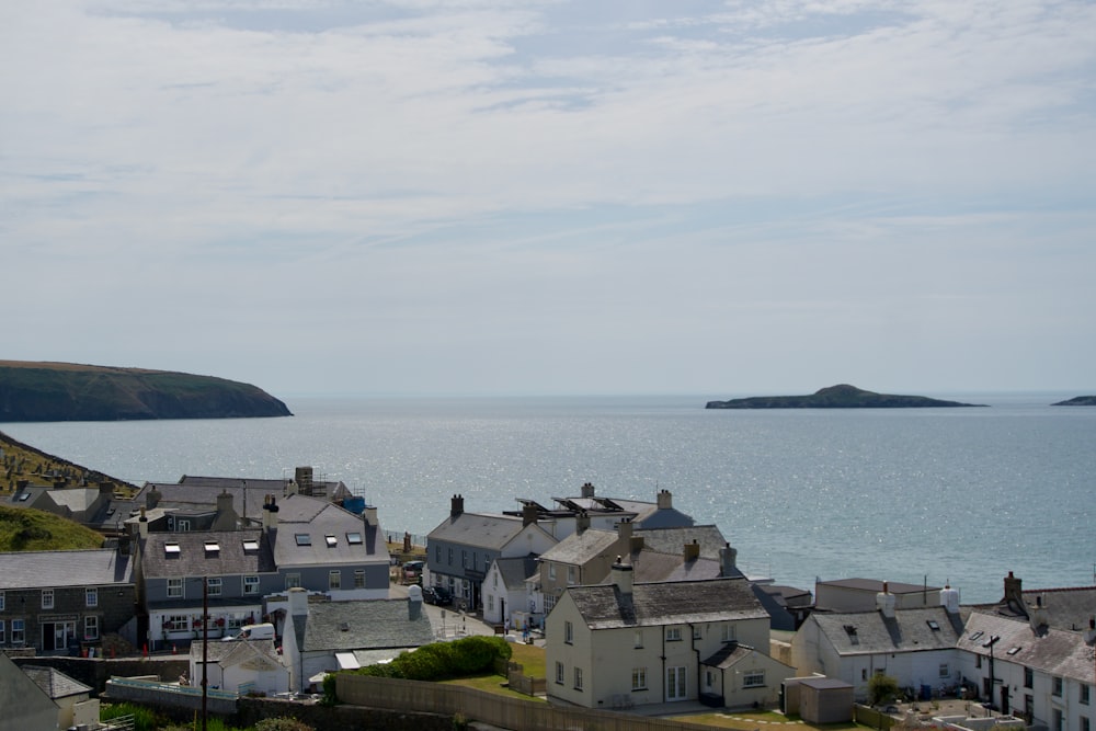 a group of buildings by the water