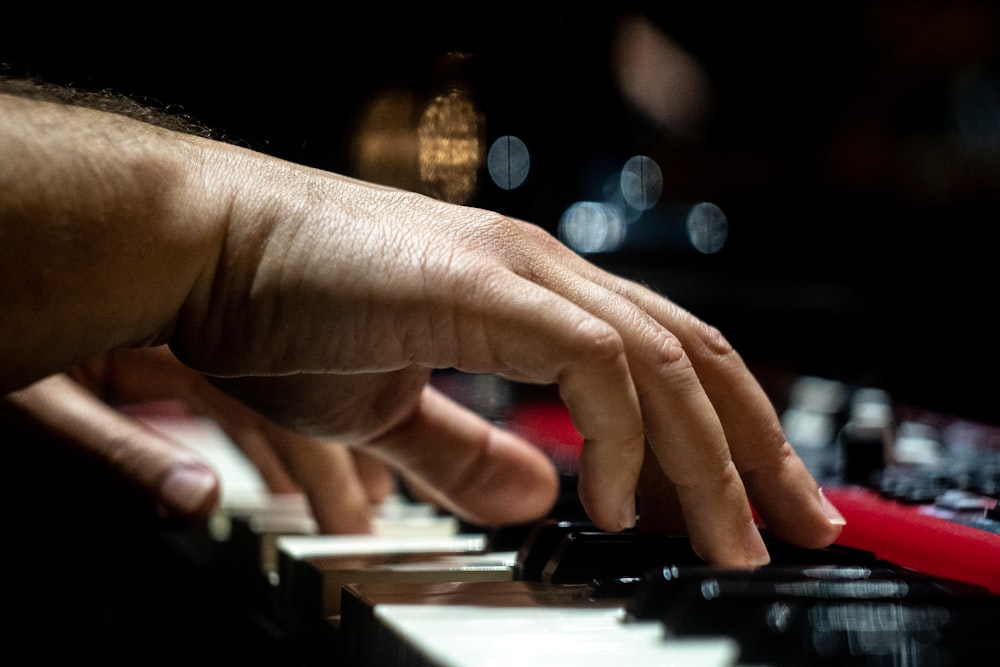 a close-up of hands on a keyboard