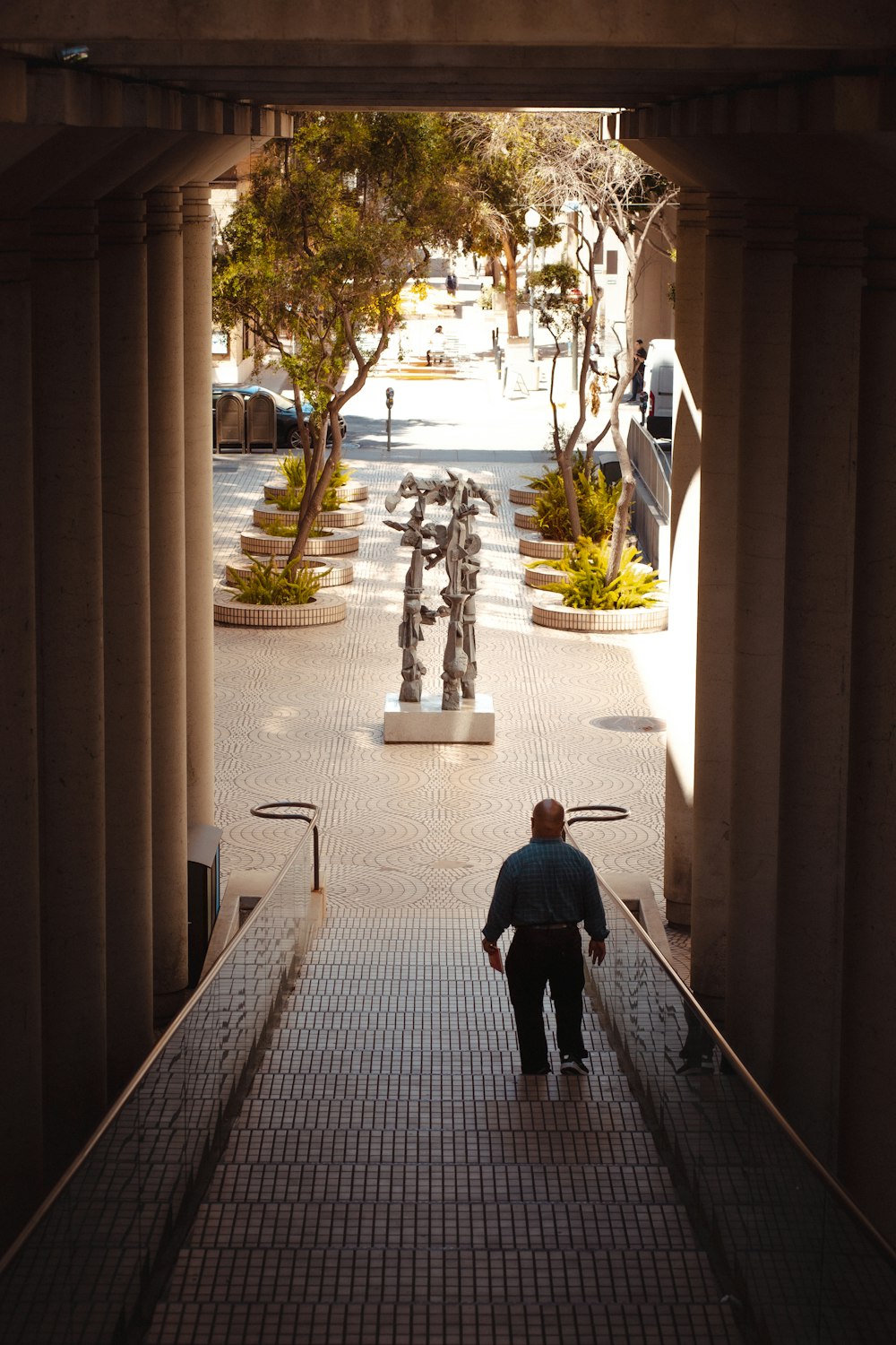 a person walking down a sidewalk