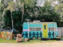 a bus is parked in a yard