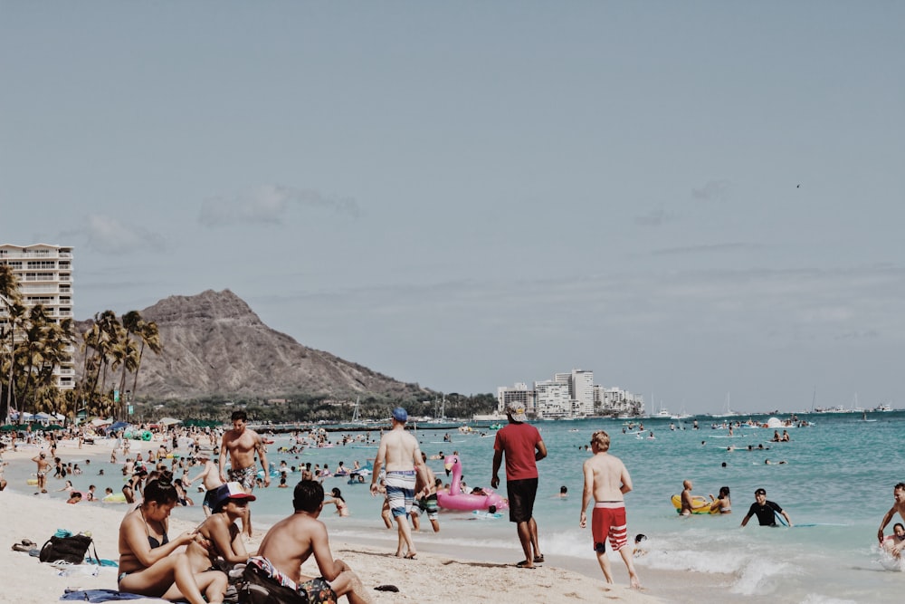 a group of people on a beach