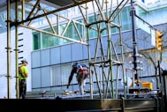 a few men working on a construction site