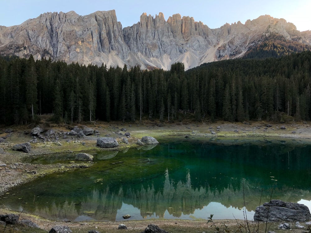 a lake with a mountain in the background