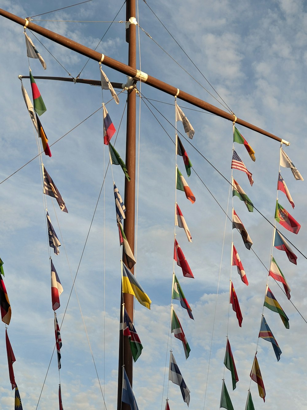 a group of flags on a boat