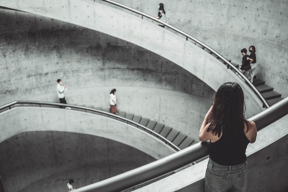 a group of people walking up a flight of stairs