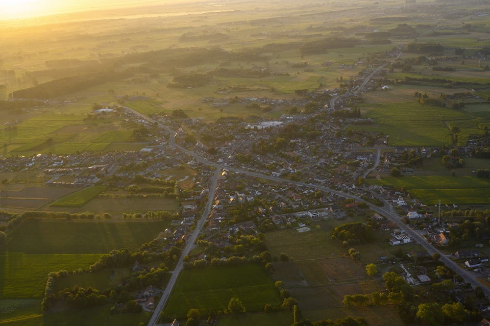 an aerial view of a road and fields