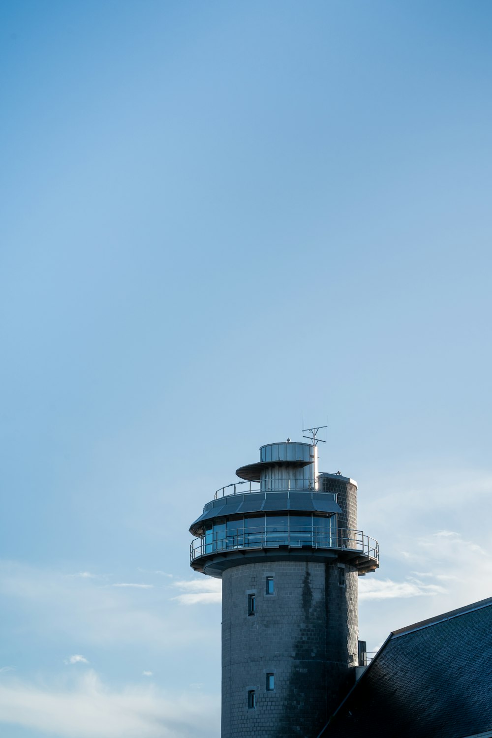 a lighthouse with a blue sky