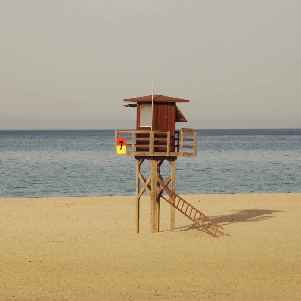 a wooden structure on a beach