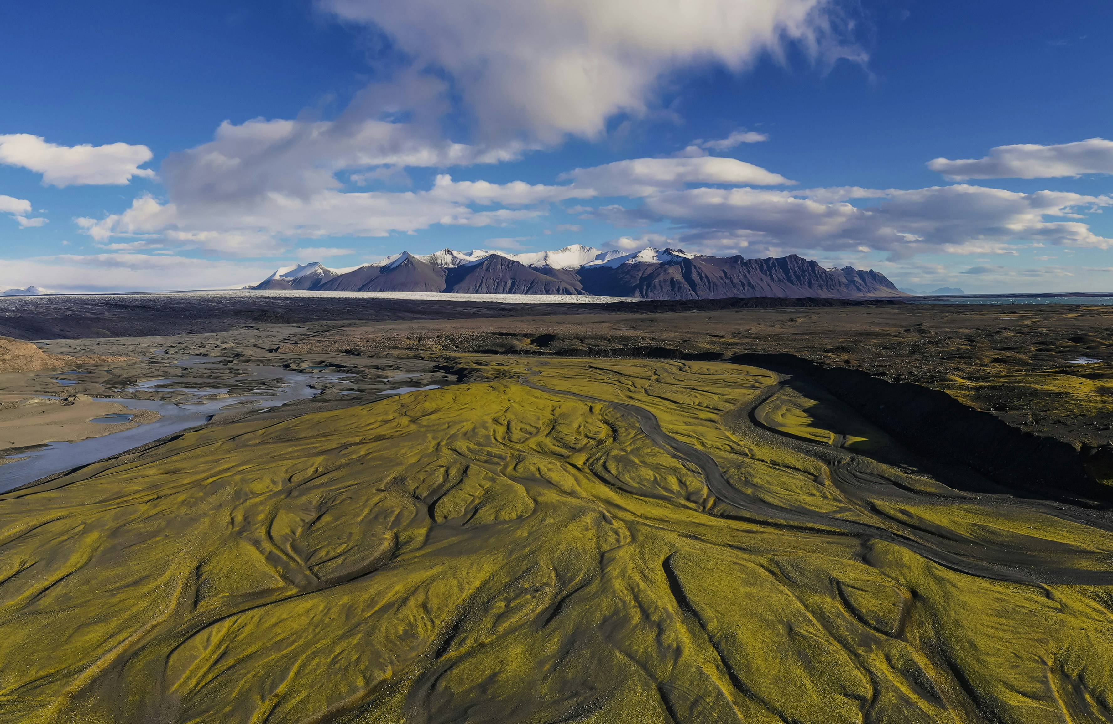 A large flat area with mountains