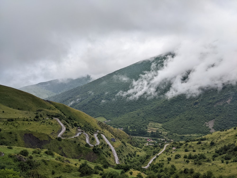 a valley with a river running through it