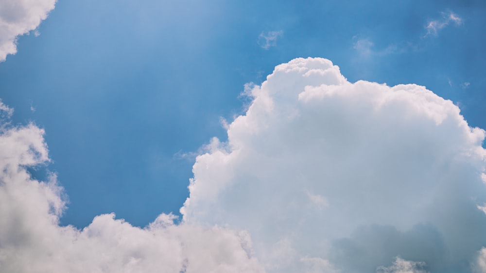 a blue sky with white clouds