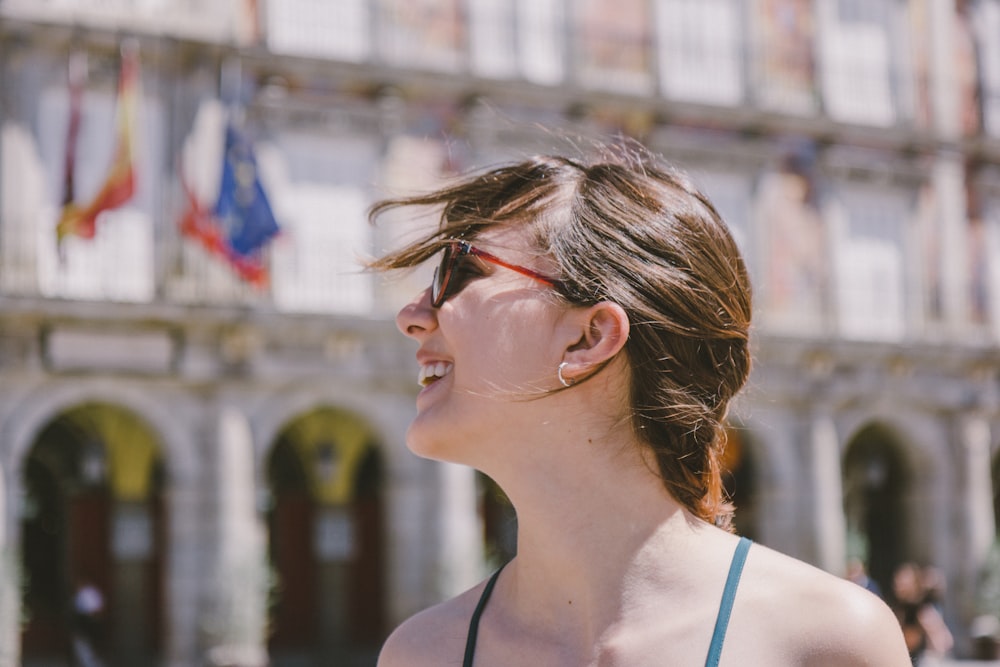 a woman with a red bandana on her head