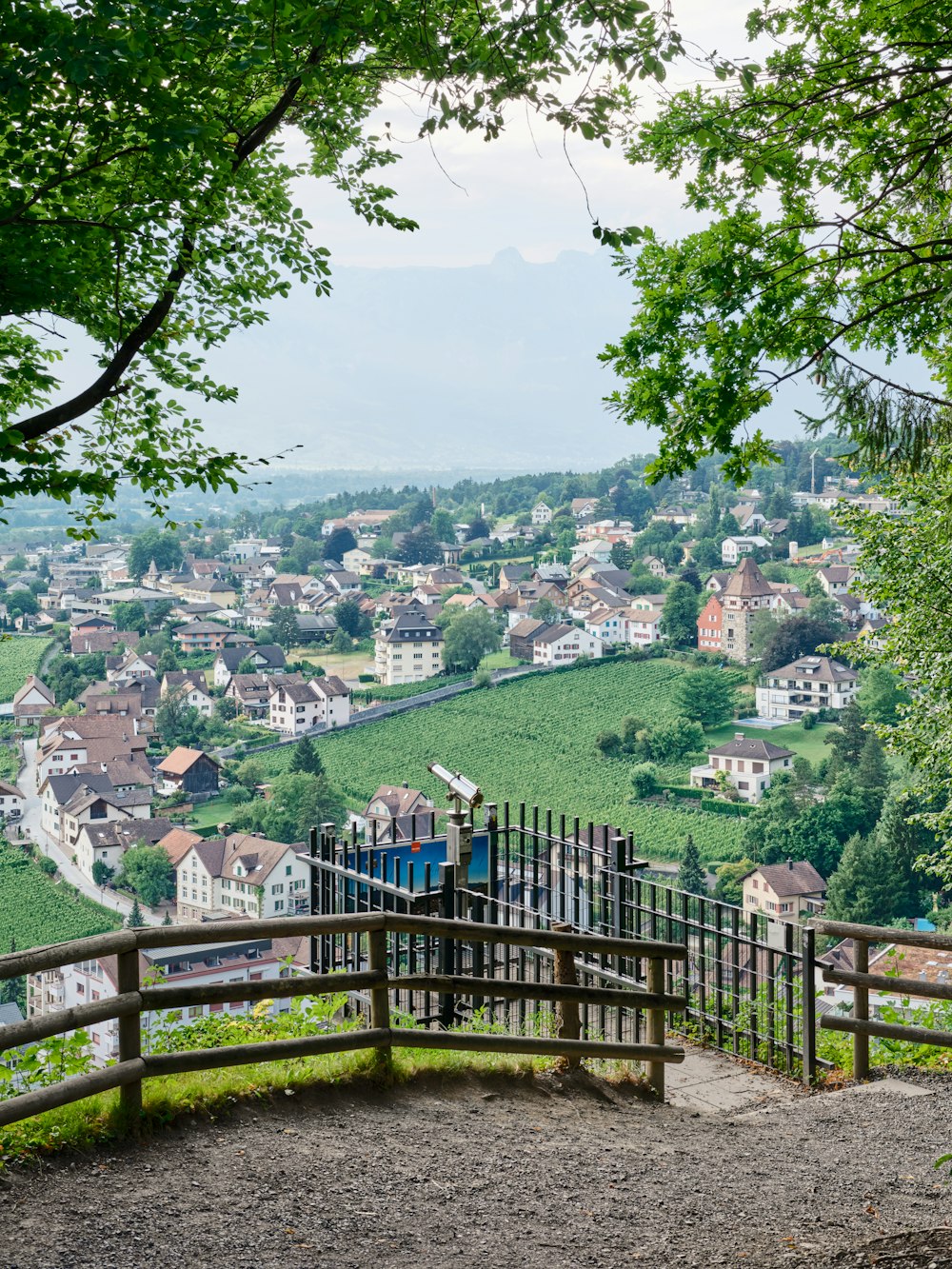 a town with a fence and trees