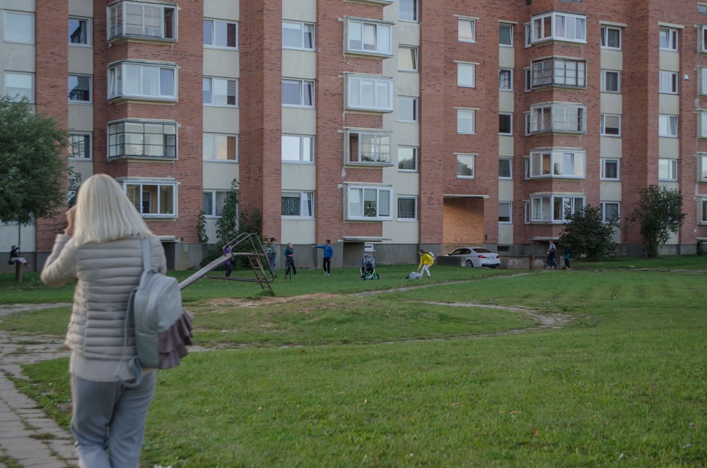 a person standing in front of a building