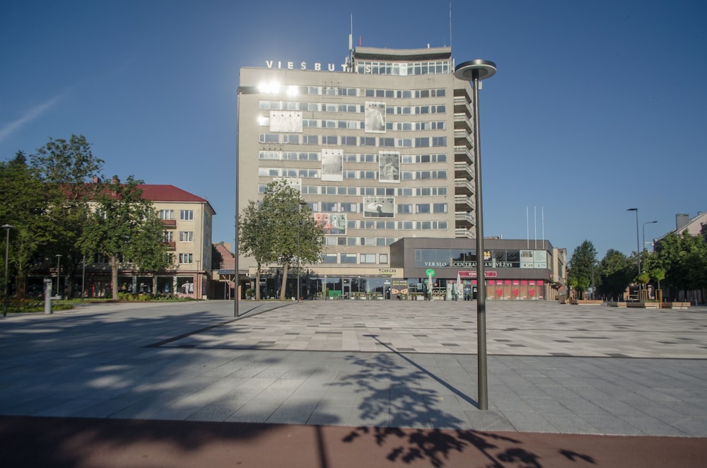 a large building with a parking lot