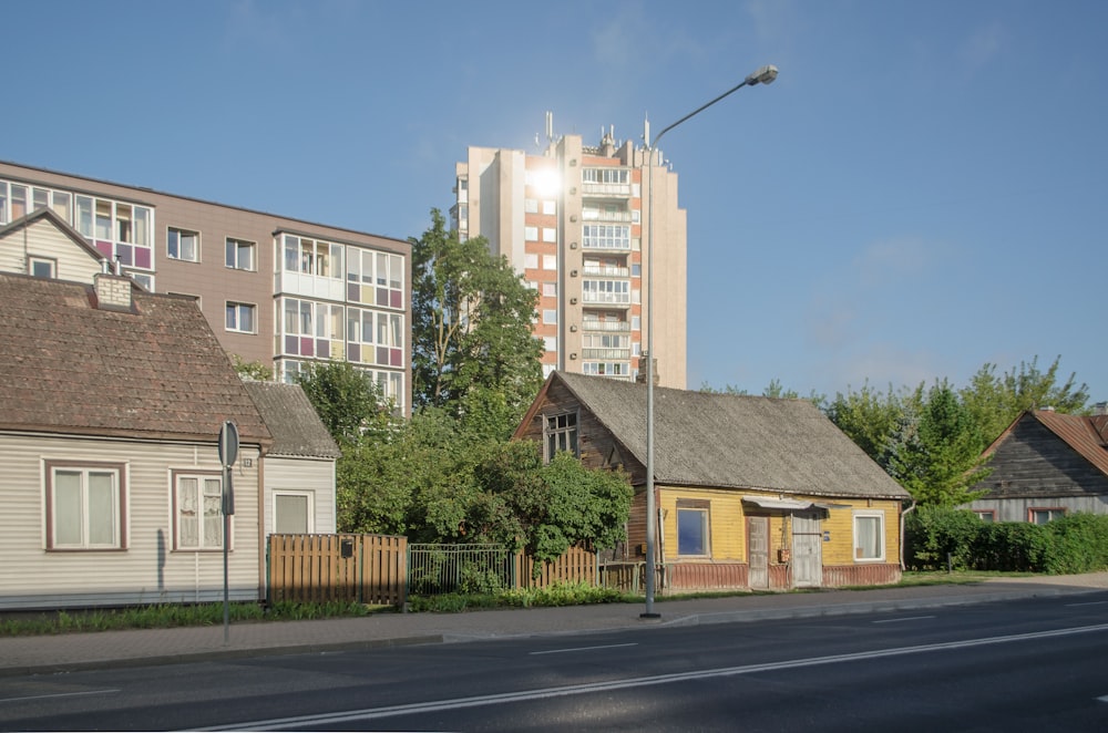 a street with houses and trees