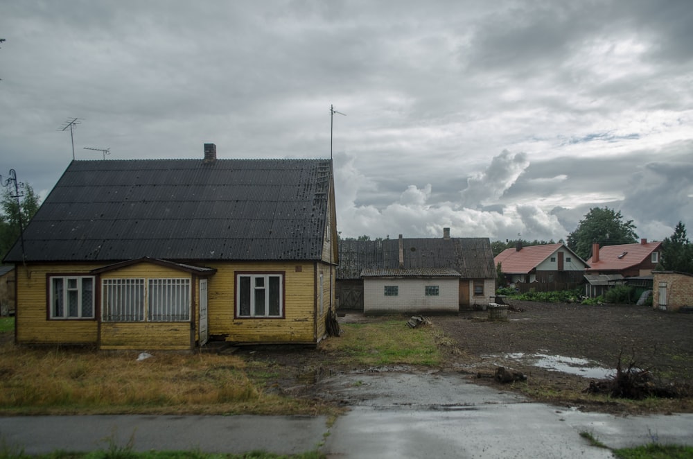 a house with a puddle in front of it