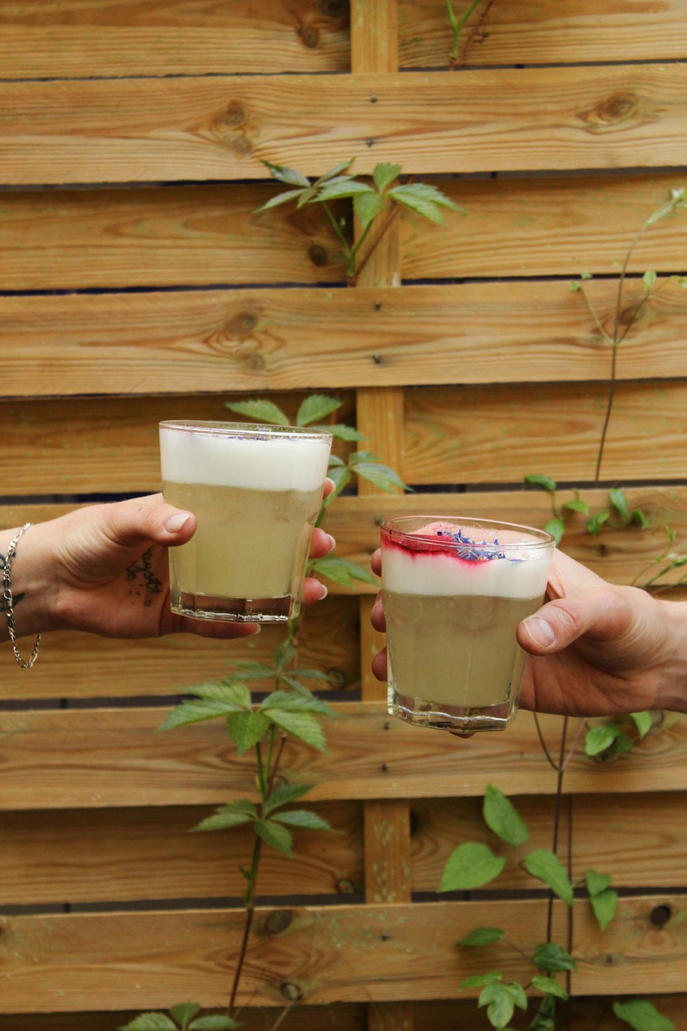 two glasses of beer on a table