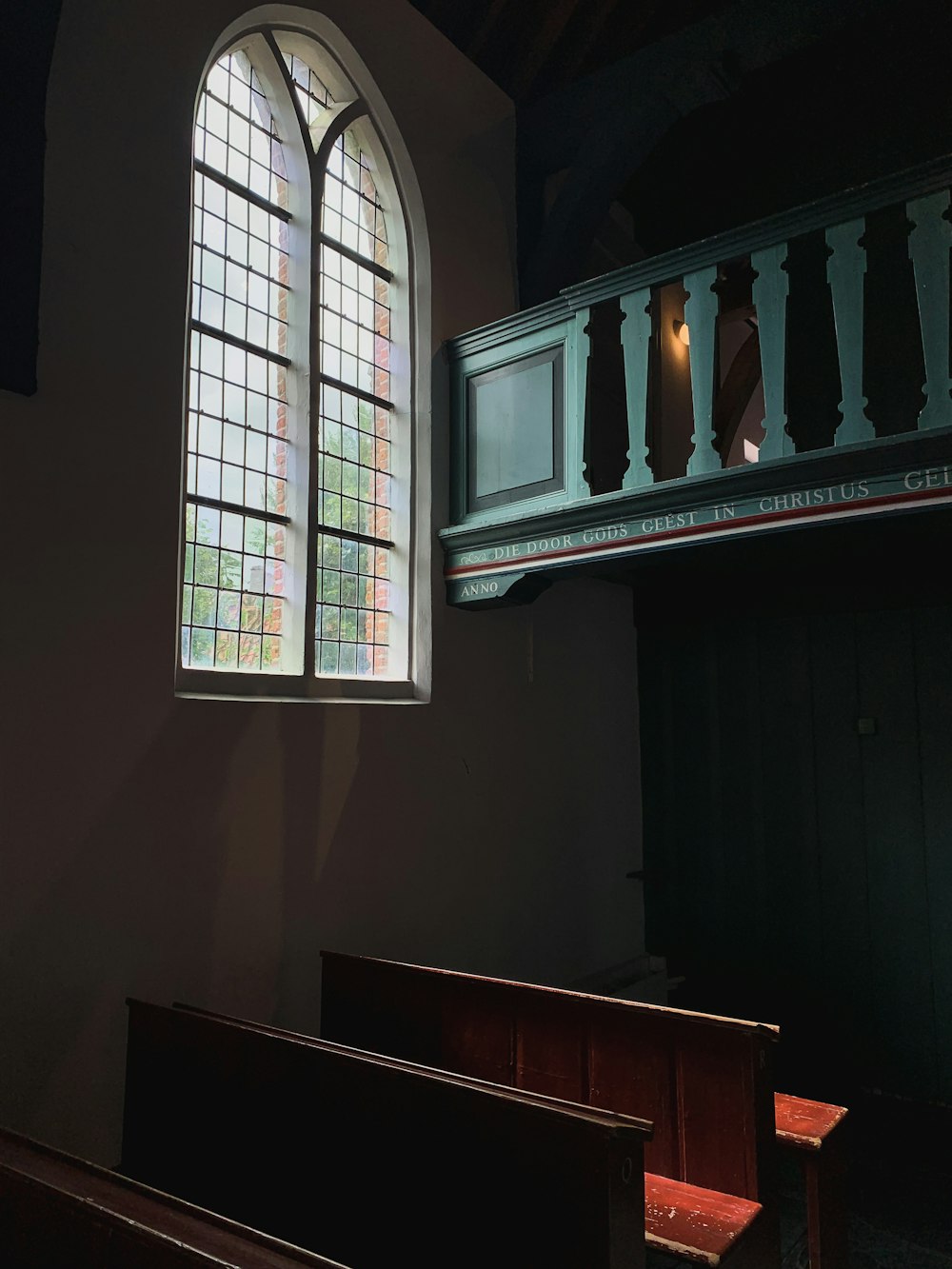 a piano in front of a window