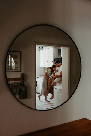 a person taking a selfie in a mirror