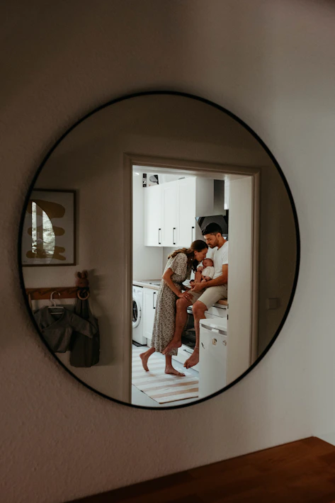 a person taking a selfie in a mirror