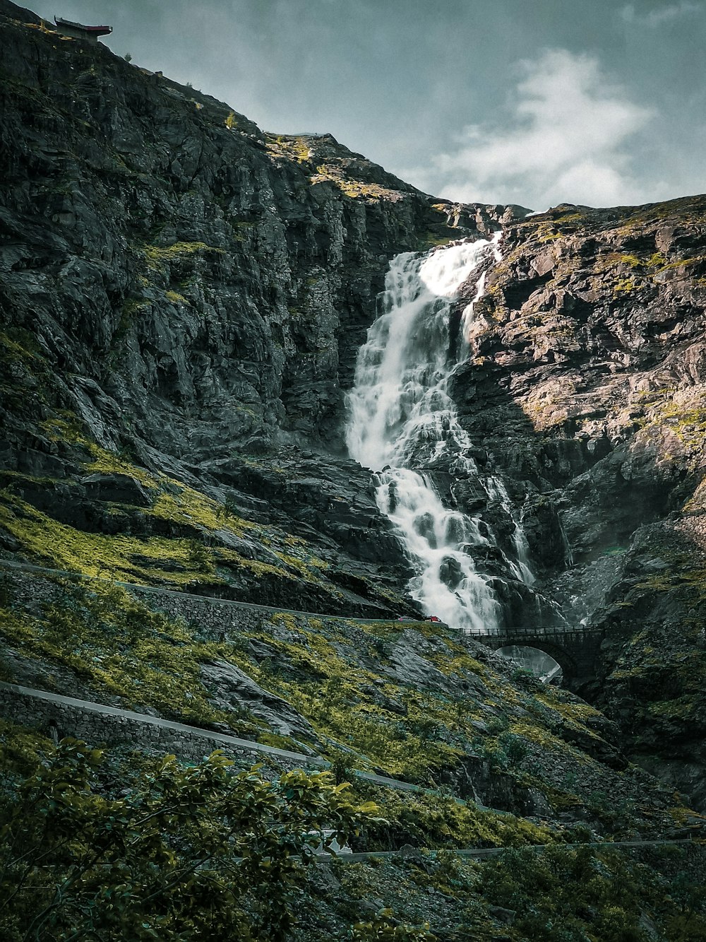 a waterfall in a valley