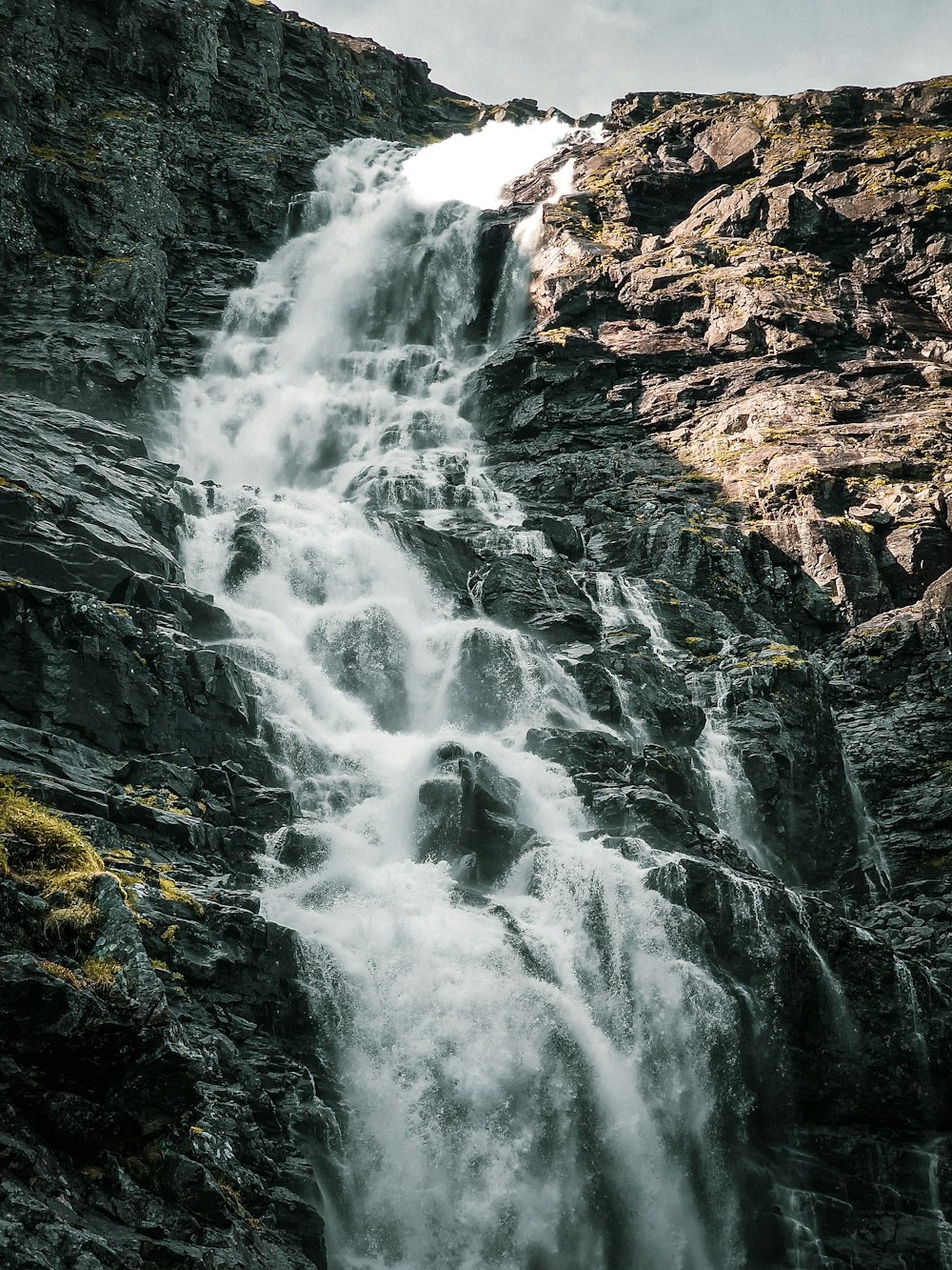 a waterfall in a rocky place