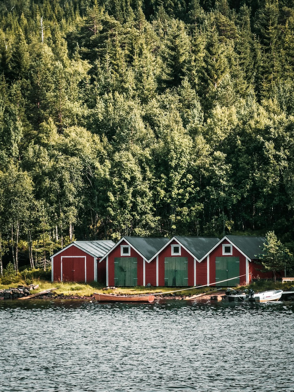 a red house on a dock