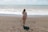 a person walking on a beach