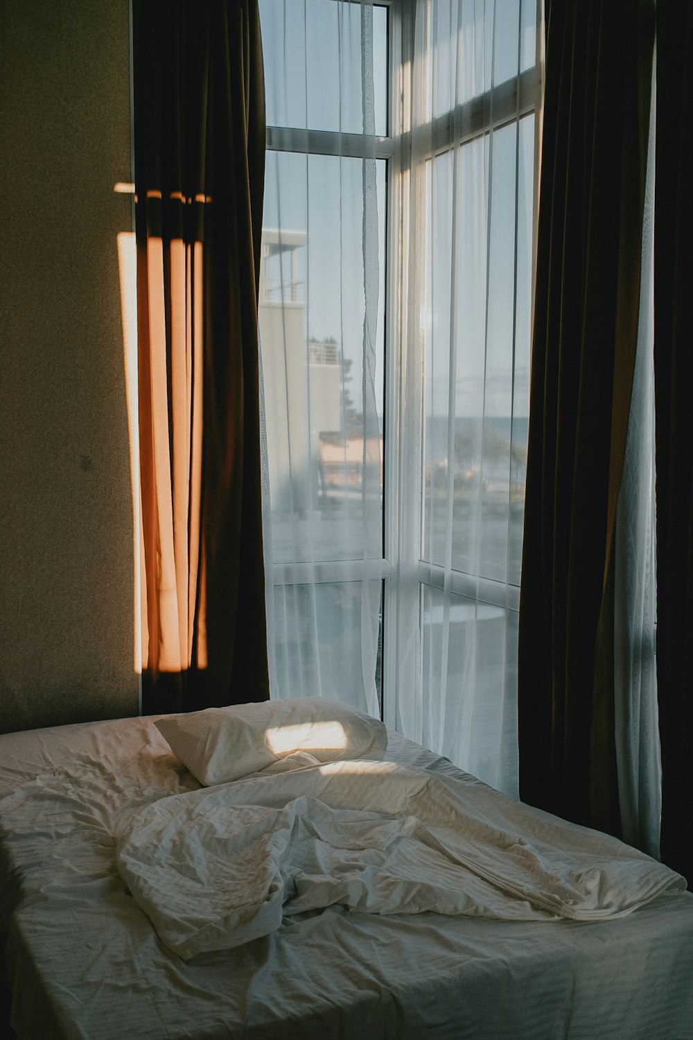 a bed with a window