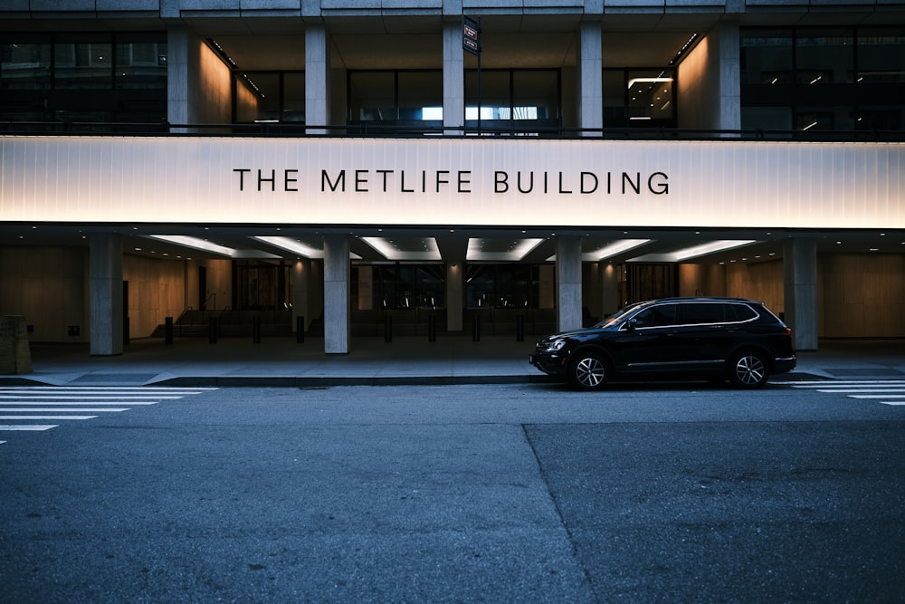 a car parked in front of a building