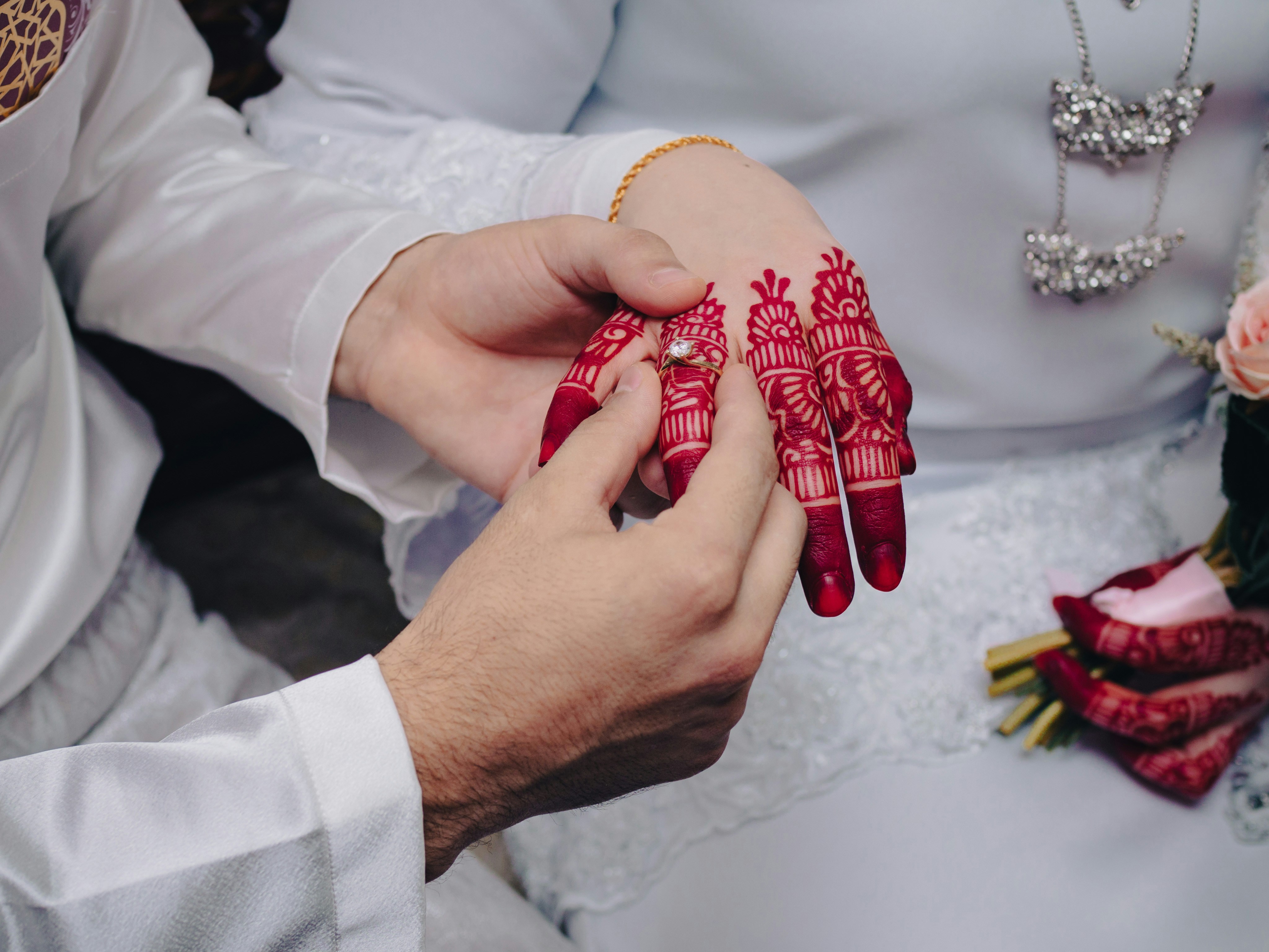 a person holding a red object