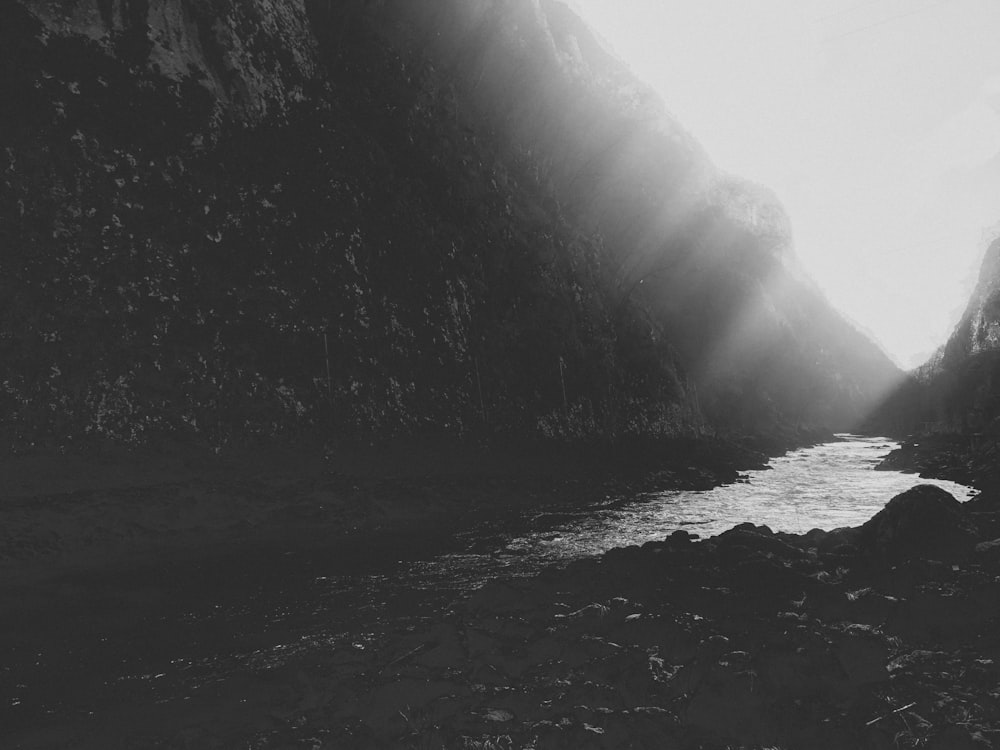 a large waterfall over a rocky cliff