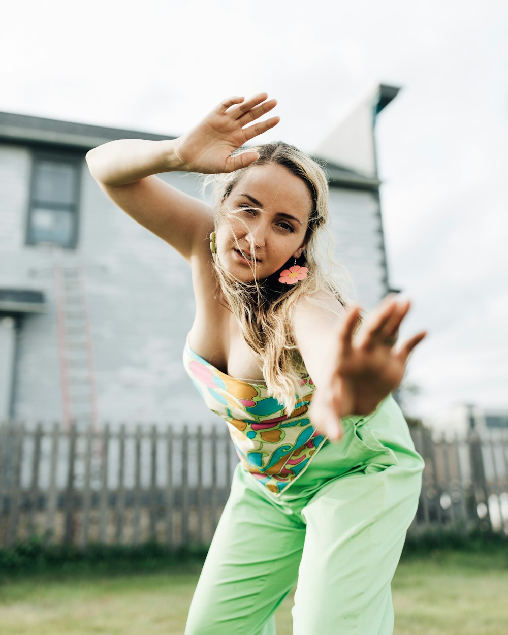 a woman in a green shirt