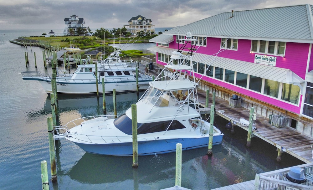 a couple of boats docked at a pier