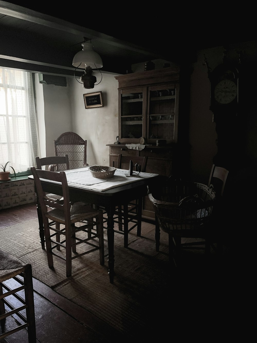 a dining room table with chairs