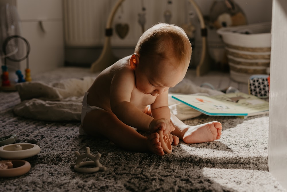 a baby crawling on the floor