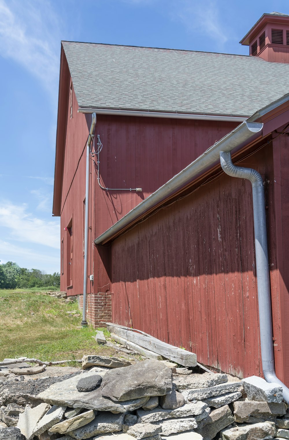 a red barn with a roof