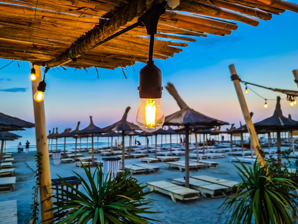 a group of umbrellas over a body of water