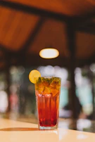 Elegant shot of a traditional Mexican beverage, agua fresca with vibrant fruit pieces.