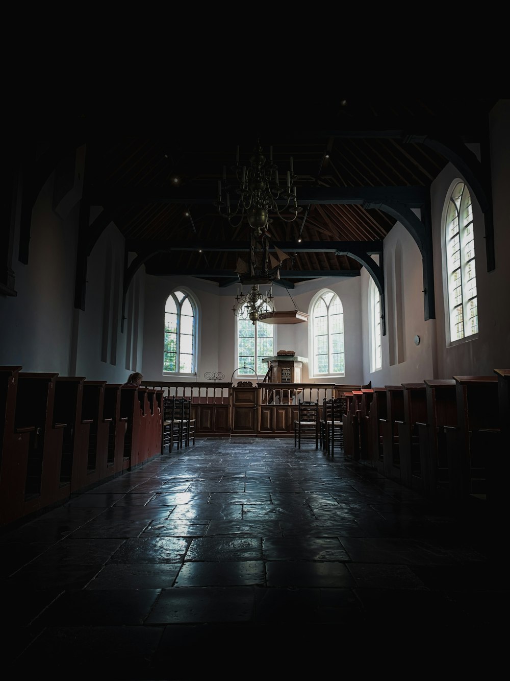 a large church with a large chandelier and many windows