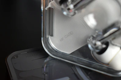 Close-up of a sleek kitchen gadget in use, highlighting its quality and design.