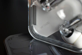Close-up of a sleek kitchen gadget in use, highlighting its quality and design.