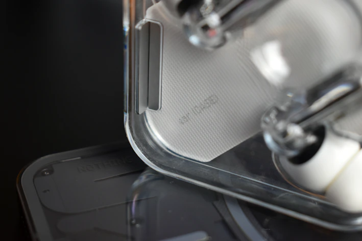 Close-up of a sleek modern gadget with minimalist design on a neutral background